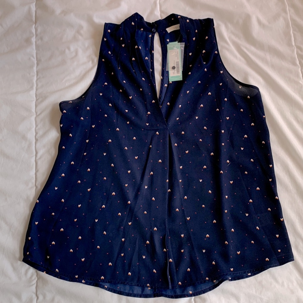 Lush sleeveless V neck blouse